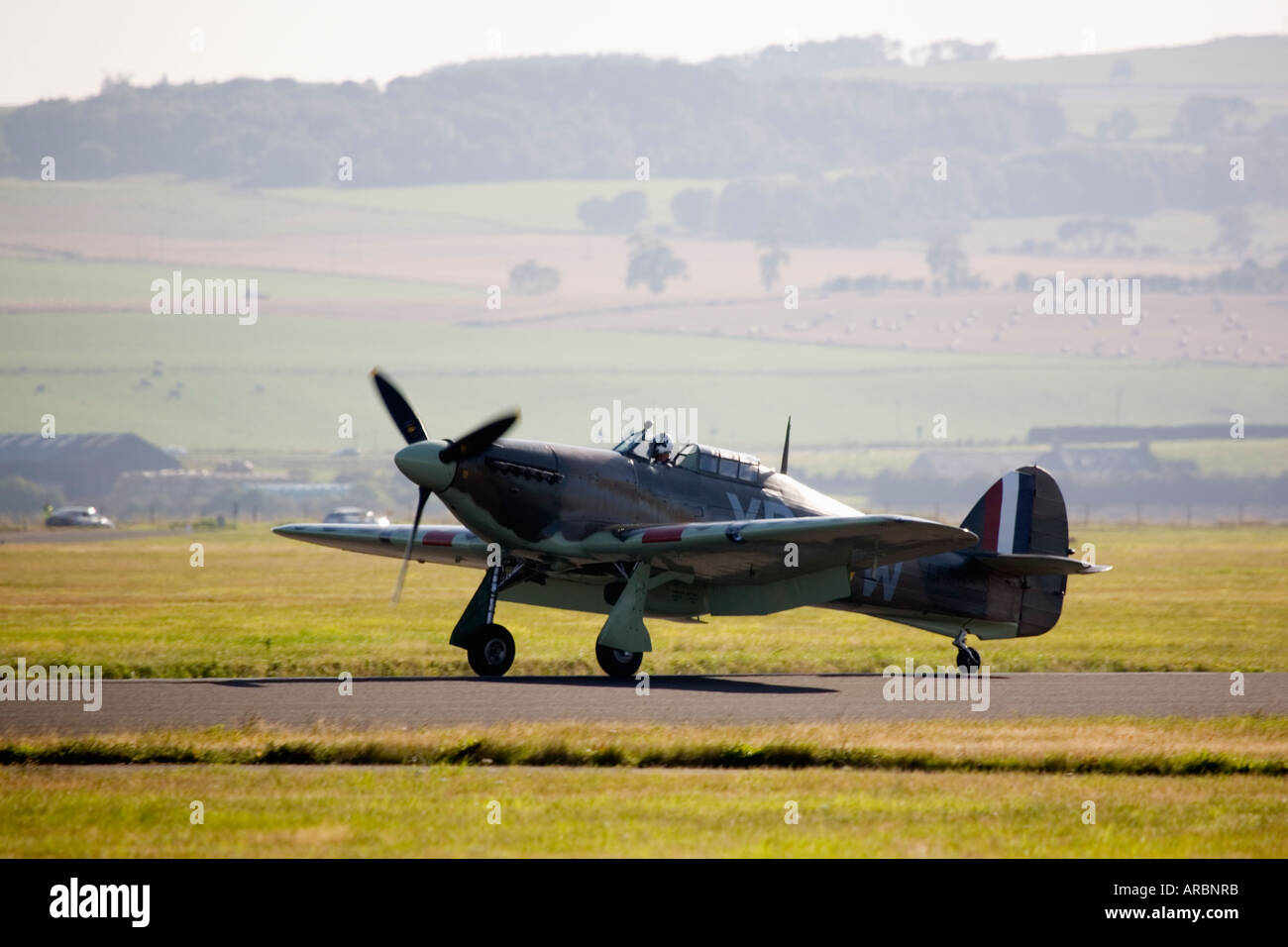 Battle of Britain Memorial Flight RAF Spitfire Fighter on runway Stock Photo