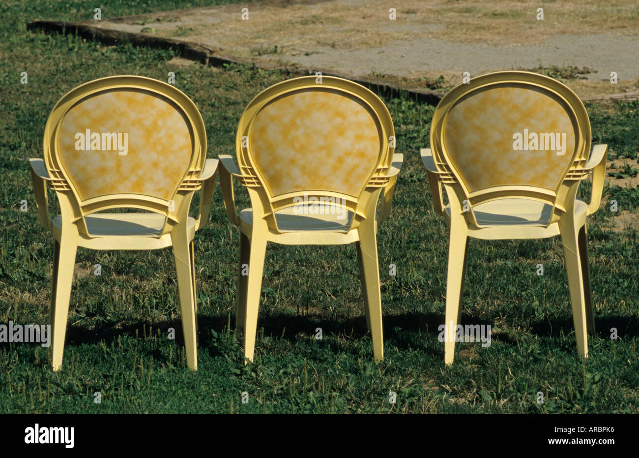 three plastic chairs Stock Photo Alamy