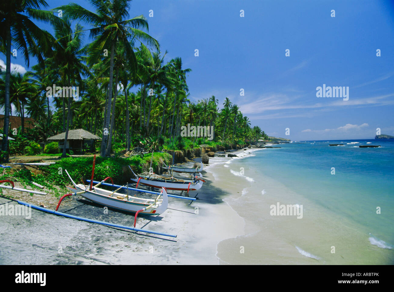 The beach at Candidasa, popular east coast resort which has lost a lot of sand to erosion, Bali, Indonesia, Asia Stock Photo