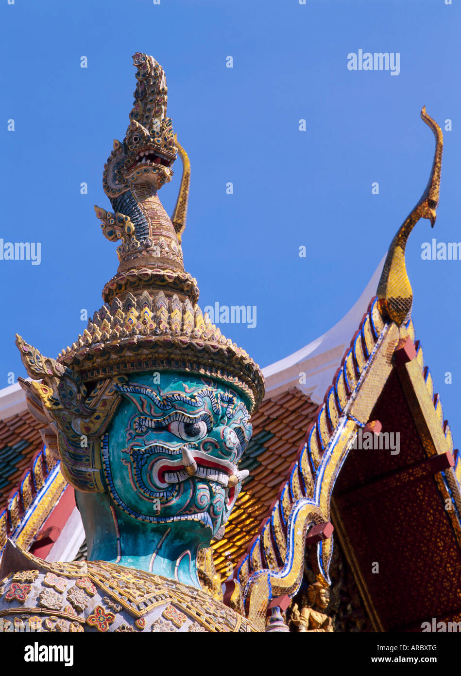 Close-up of the statue of a guardian at the Grand Palace in Bangkok ...