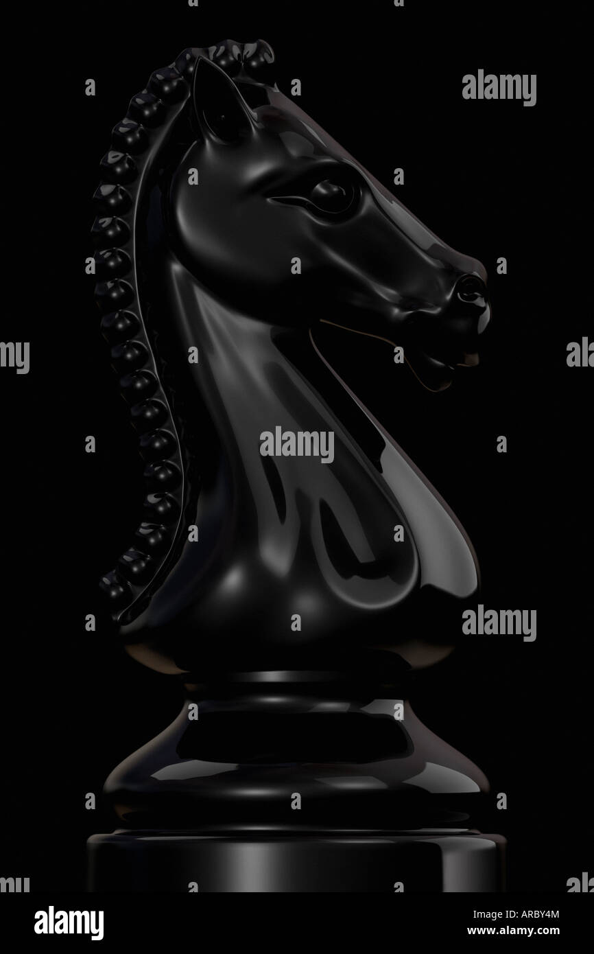 Black chess piece knight against black background Stock Photo