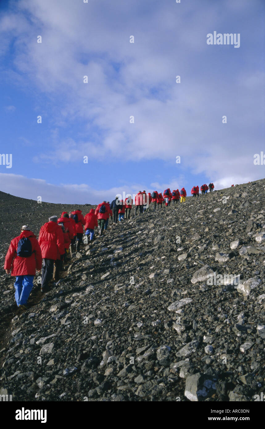 Tourists ascending recent volcanic cone, Penguin Island, South Shetland Islands, Antarctica, Polar Regions Stock Photo