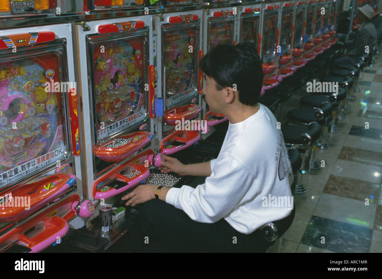 Playing game machine, pachinko parlour, Tokyo, Japan Stock Photo