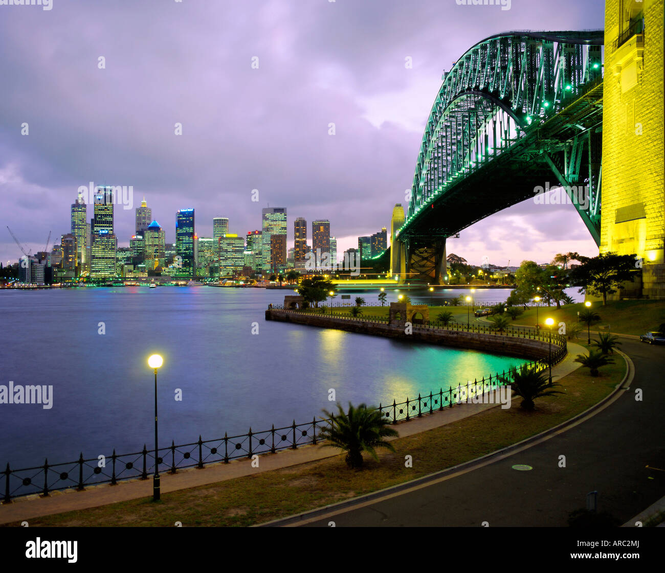 City skyline and the Sydney Harbour Bridge at dusk, Sydney, New South Wales, Australia Stock Photo