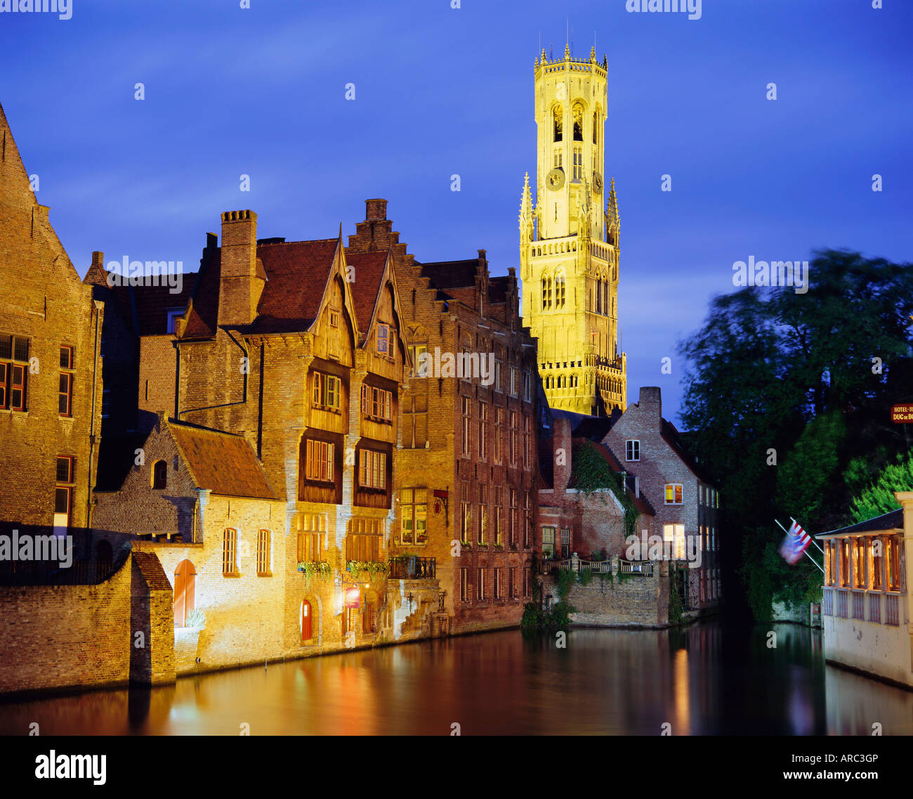 Gabled Houses and 13th c. Belfry along the canals, Bruges, Belgium Stock Photo