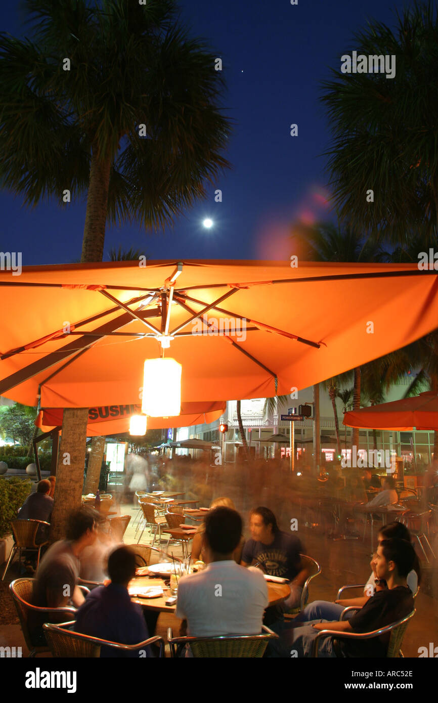 Miami Beach Florida,Lincoln Road mall,entertainment,performance,show,al fresco sidewalk outside outdoors tables,dining out,eat,taste,food,night nightl Stock Photo