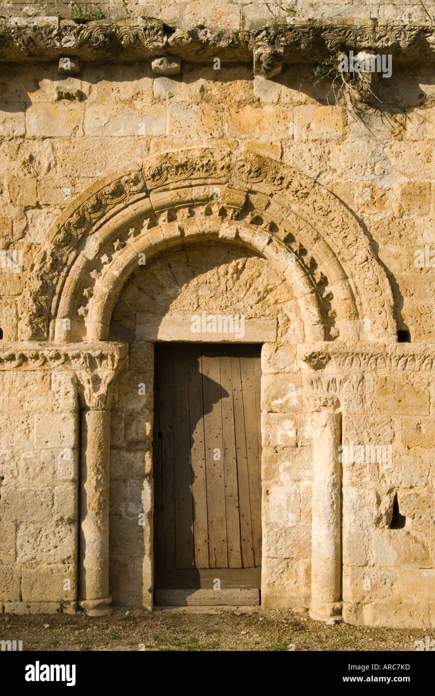 Semi circular arched doorway Church of St Savinien Melle Deux Sevres Poitou Charentes France Stock Photo
