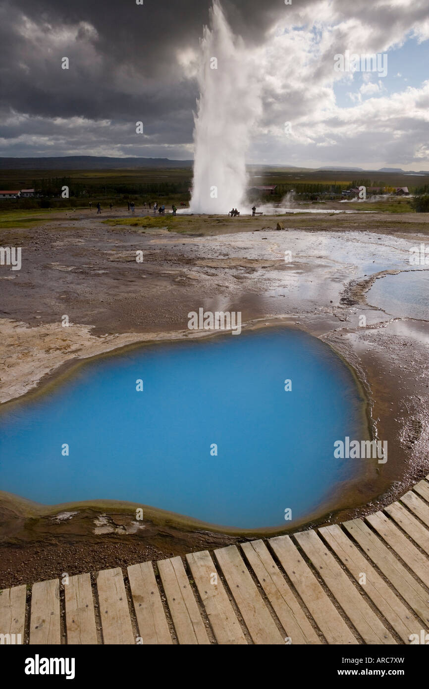 Strokkur (the Churn) which spouts up to 35 meters erupting every 10 minutes, Geysir, Golden Circle, Iceland, Polar Regions Stock Photo