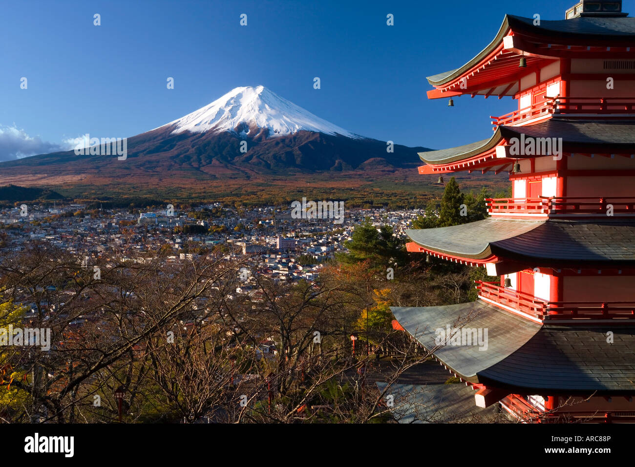 Mount Fuji capped in snow and the upper levels of a temple, Fuji-Hakone-Izu National Park, Chubu, Central Honshu, Japan, Asia Stock Photo