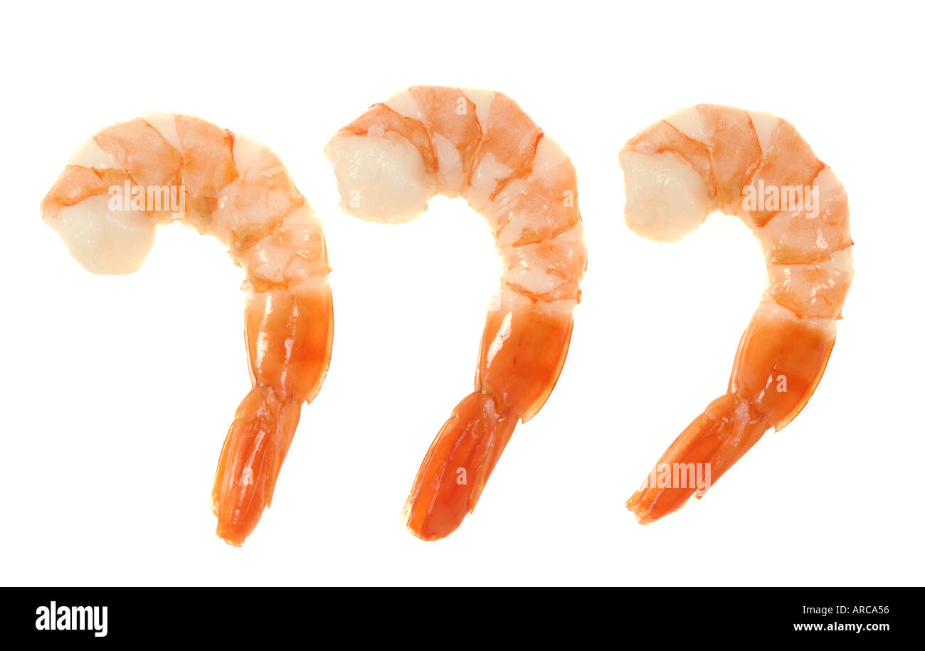 peeled prawns on white background cutout cut out 3 three yellow red orange handfood food seafood Stock Photo