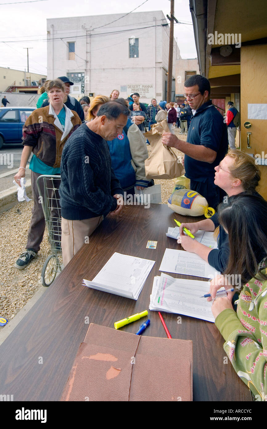 A Low Income Man Collects Donated Food For A Christmas Dinner At A Stock Photo Alamy