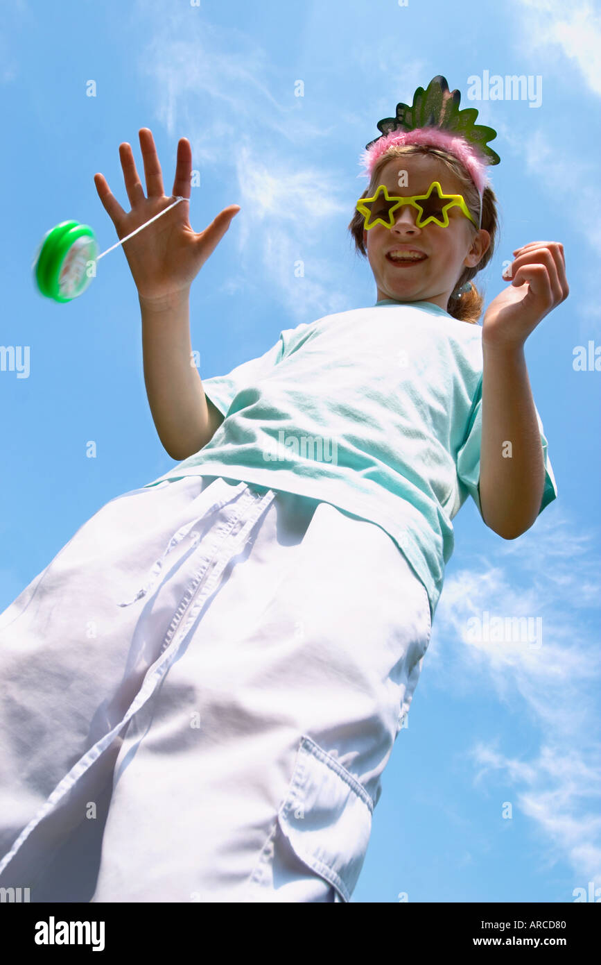 Young girl playing yoyo hires stock photography and images Alamy