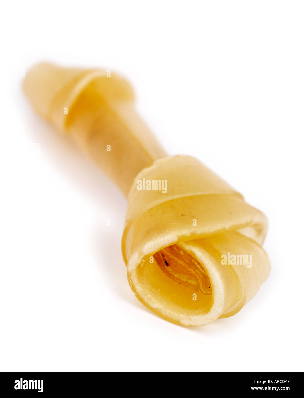 Dog chew bone raw hide Stock Photo Alamy