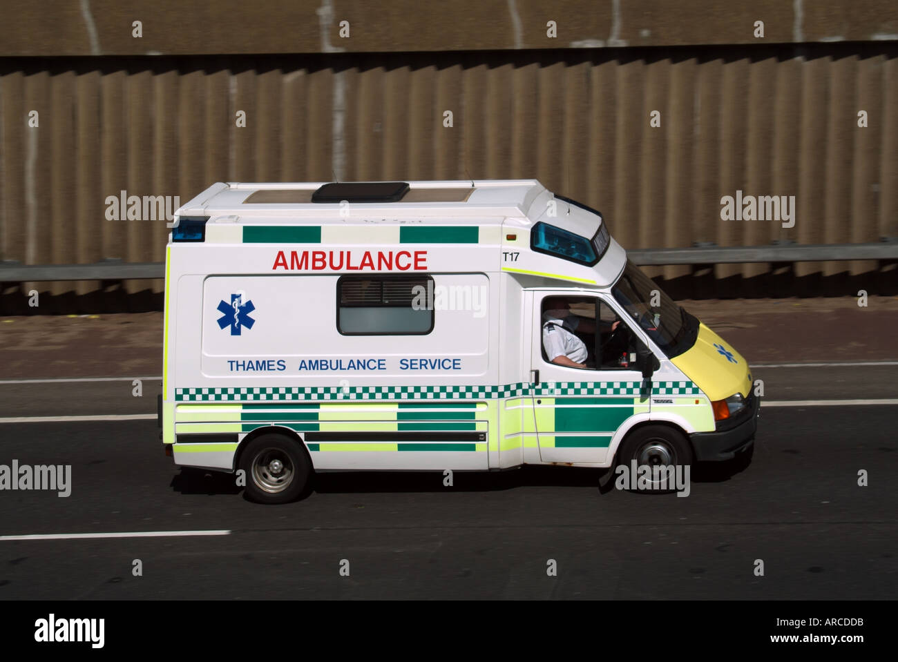 Thames Ambulance service vehicle operating in the private sector and augmenting some NHS Trusts ambulance services routine trip Stock Photo