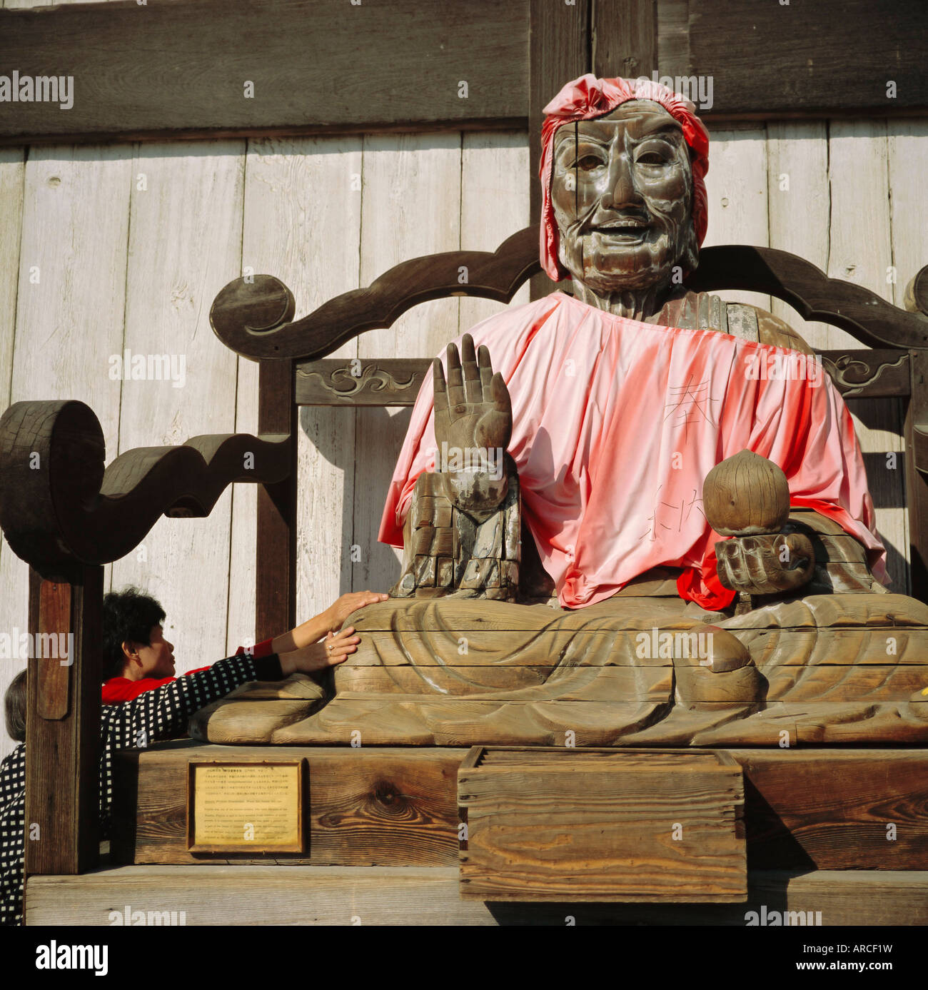 Buddhist Todai-ji Temple, image of Binzuru - touching it is supposed to cure illness, Nara, Japan Stock Photo