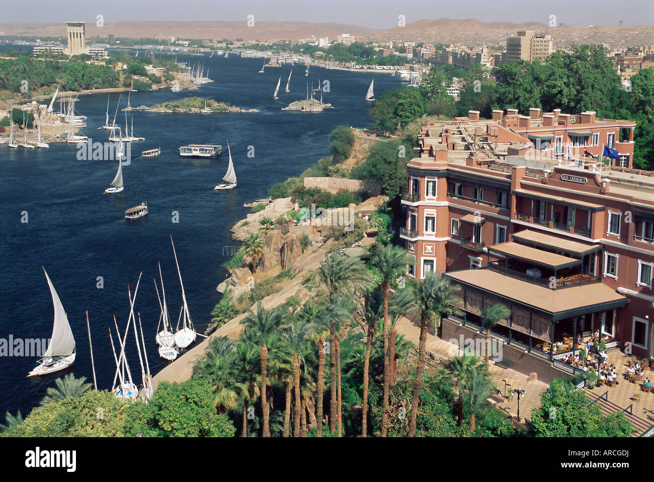 Feluccas on the River Nile and the Old Cataract Hotel, Aswan, Egypt, North Africa, Africa Stock Photo
