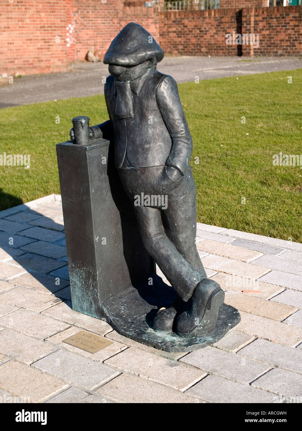 A bronze statue of a well known cartoon character Andy Capp at the Headland Hartlepool Co Durham, home of his creator Reg Smythe Stock Photo