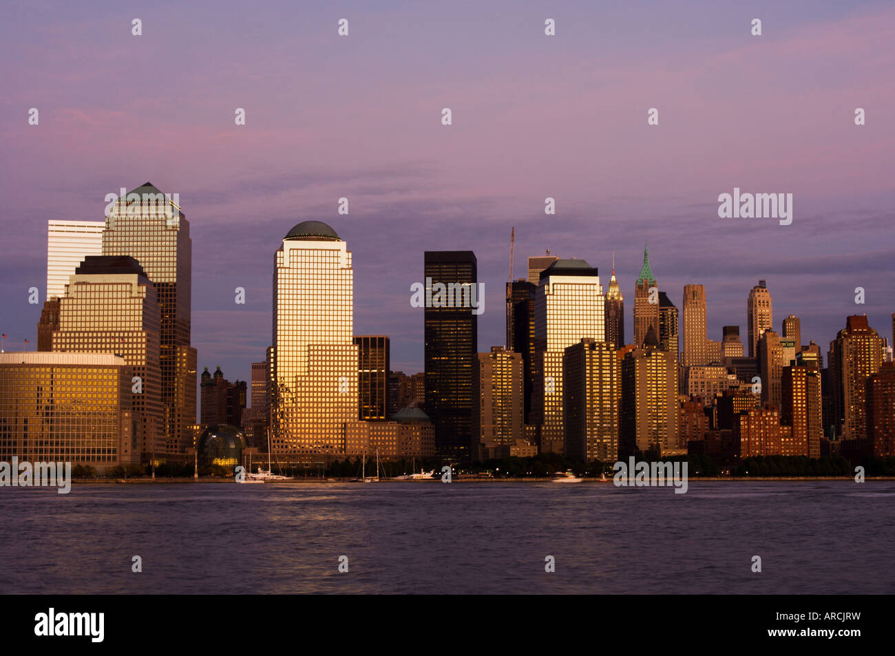 Lower Manhattan skyline across the Hudson River at dusk, New York City ...