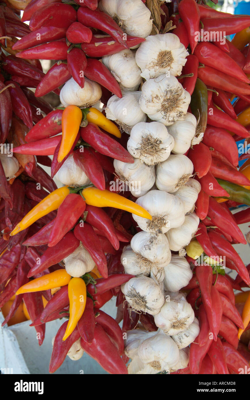 string of red chillie garlic Stock Photo