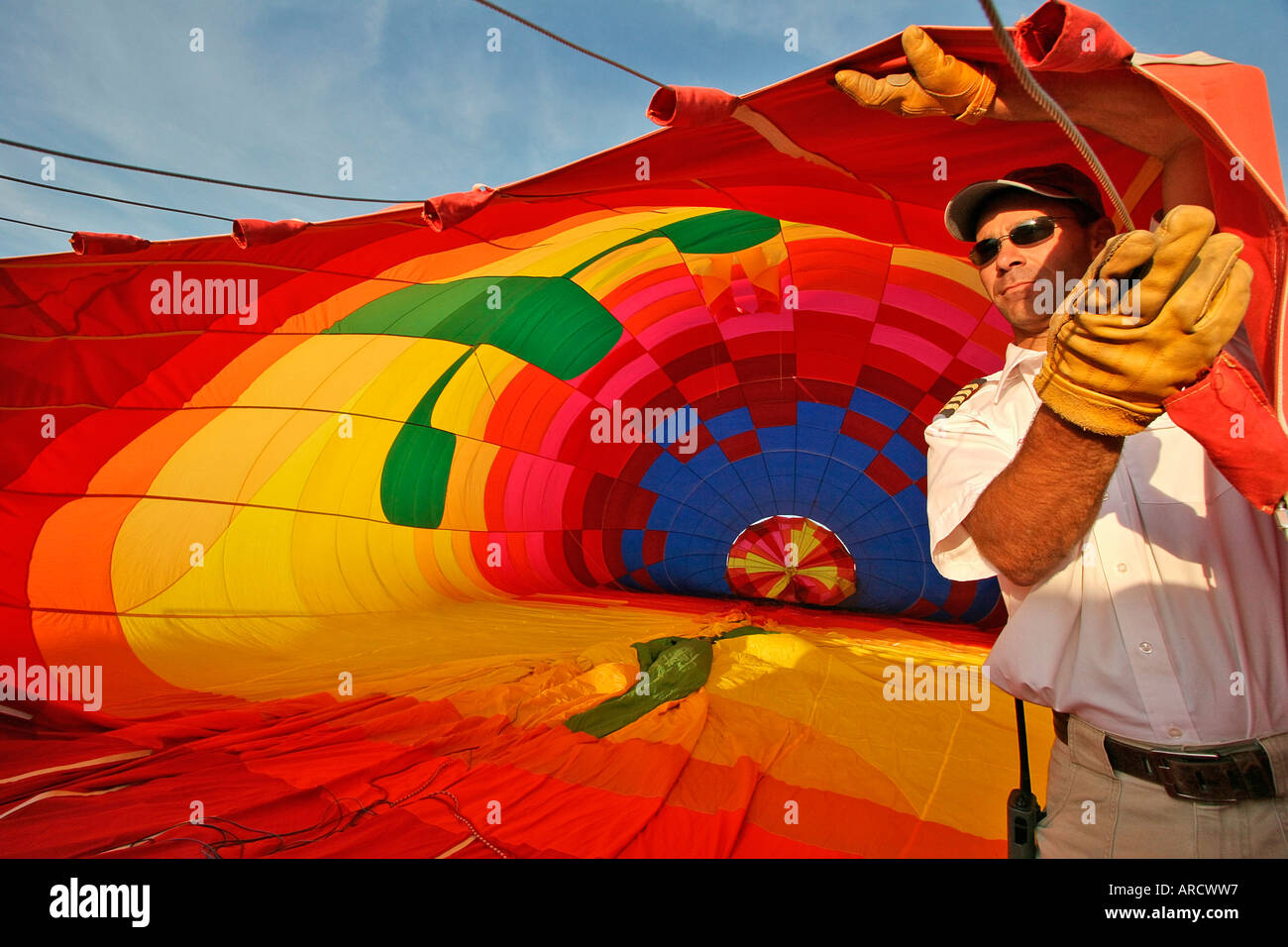 Pilot inflates hot air balloon in Arizona desert, USA Stock Photo