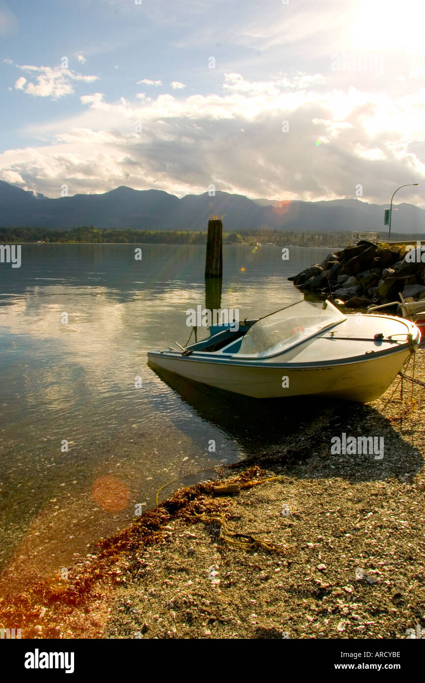 Boat Resting on Beach Hornby Island Stock Photo Alamy