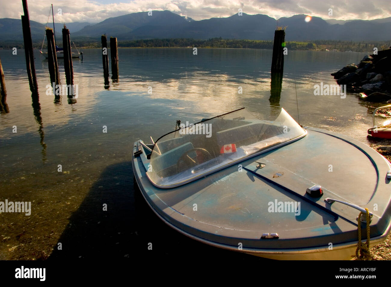 Hornby Island Boat Resting in Water on Beach Stock Photo Alamy