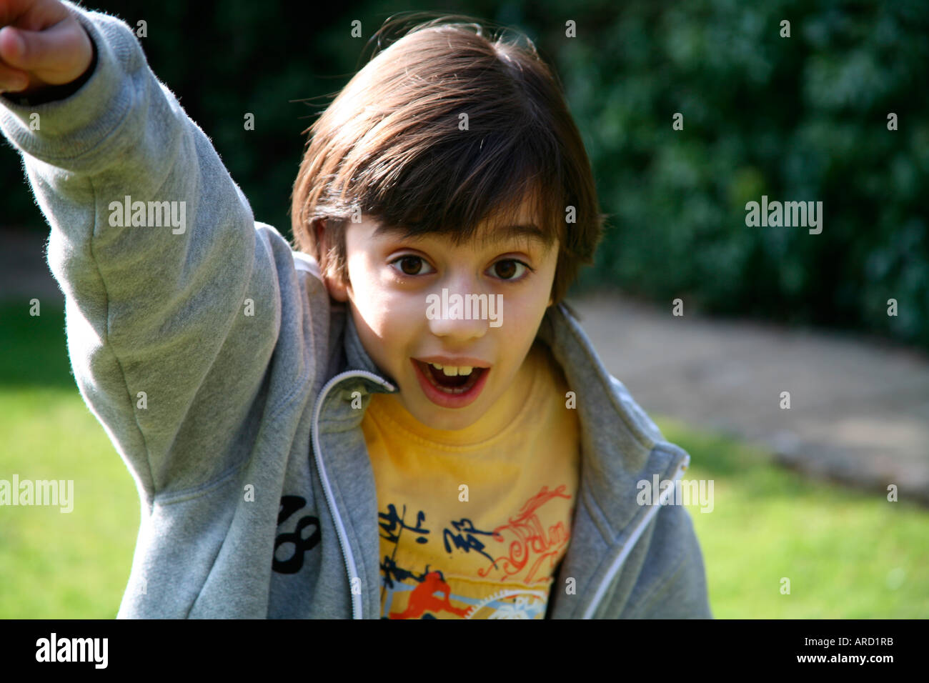 Child raising arms and cheering hires stock photography and images Alamy