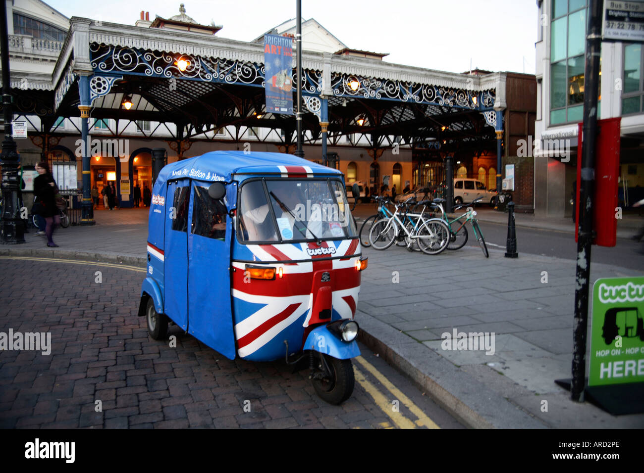 Union Jack design on TucTuc/Tuk Tuk/Auto Rickshaw outside Brighton railway station, UK Stock Photo