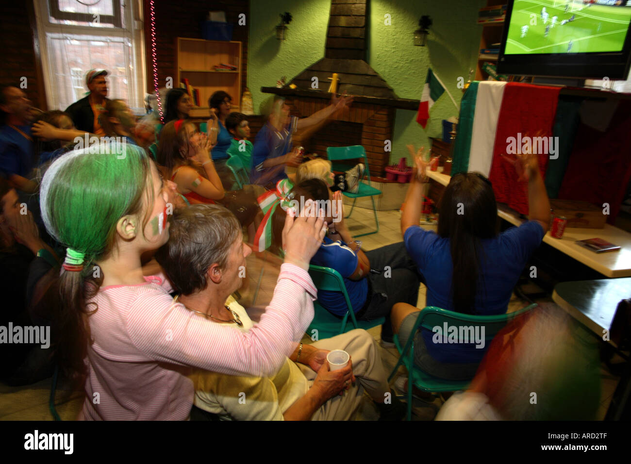Young Italian applauding her team vs France, 2006 World Cup Final, St Peters Social Club, Clerkenwell, London Stock Photo