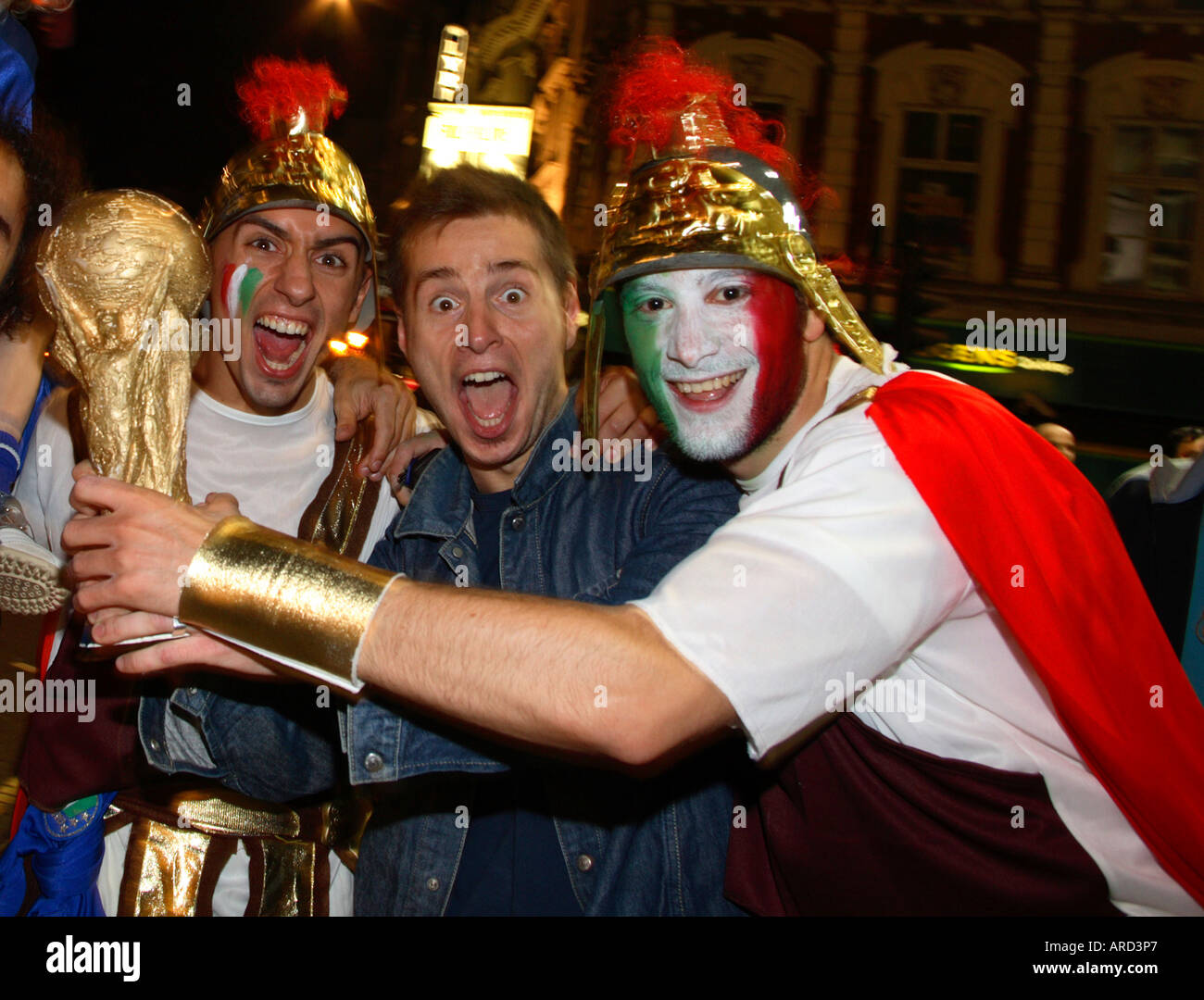 Roman gladiators celebrating in Shaftesbury Avenue after winning 2006 World Cup vs France, Soho, London Stock Photo