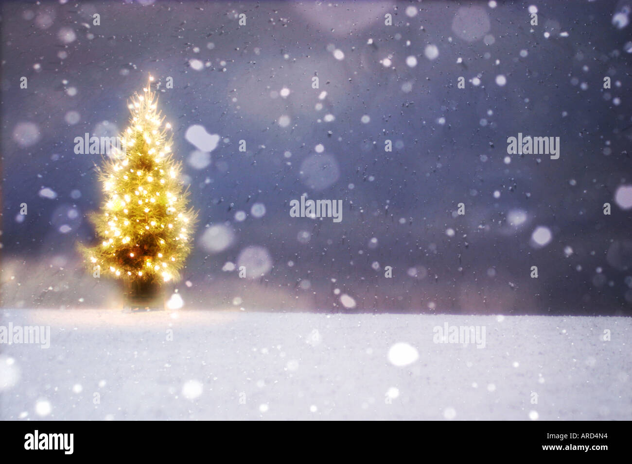 Snowfall on christmas tree hi-res stock photography and images - Alamy