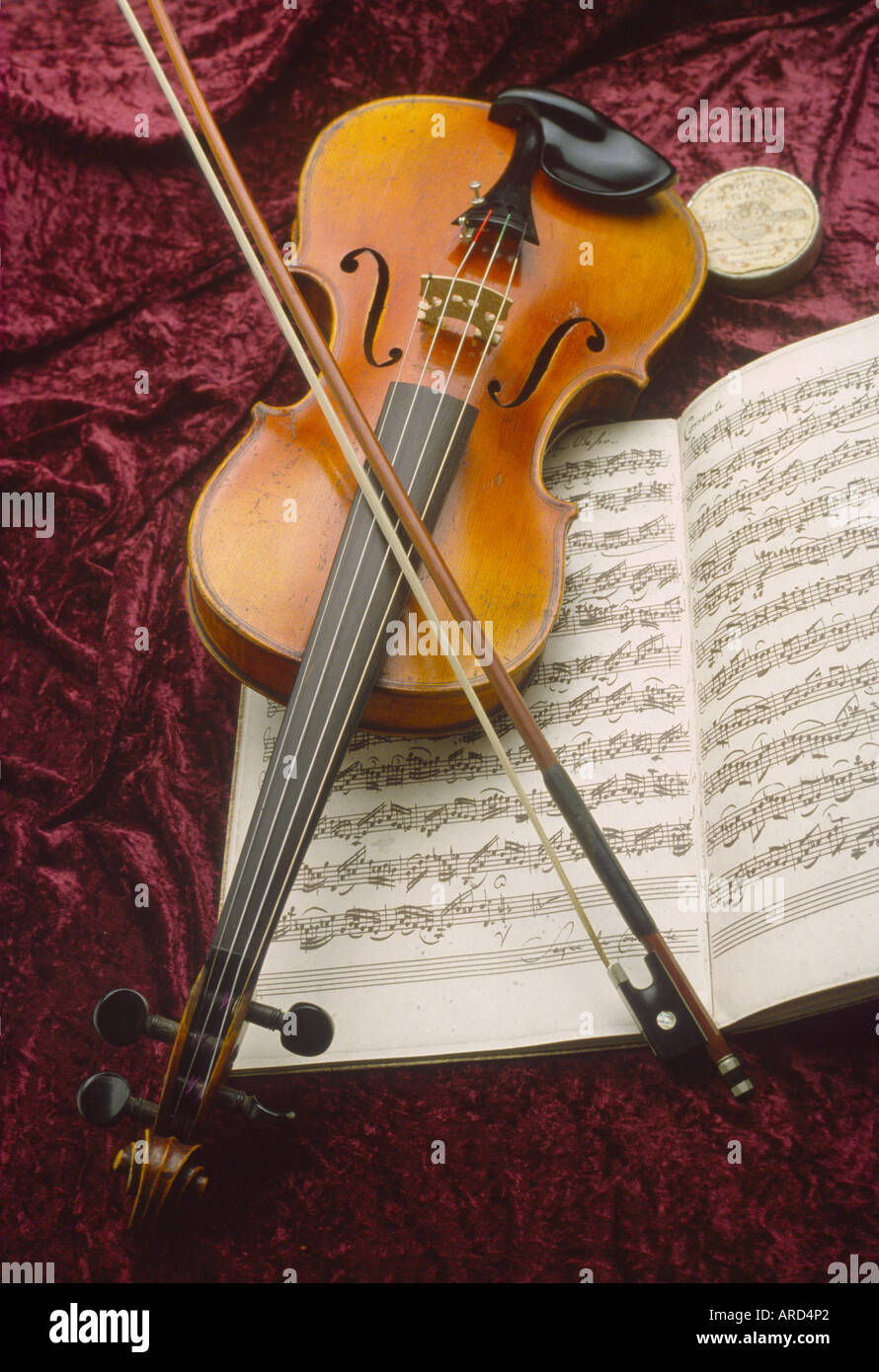Violin and music with bow and rosin all antique Stock Photo