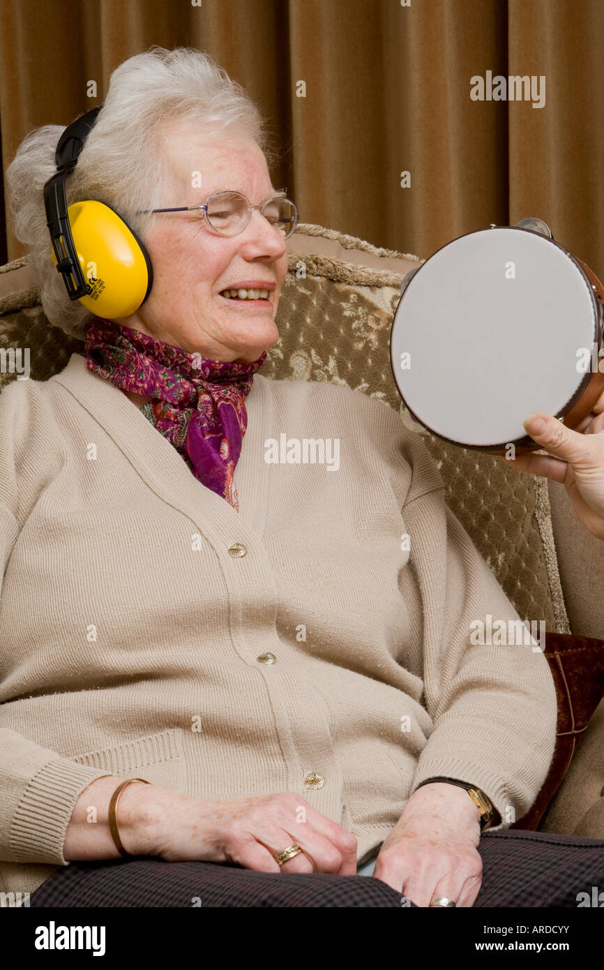 Senior wearing ear defenders hires stock photography and images Alamy