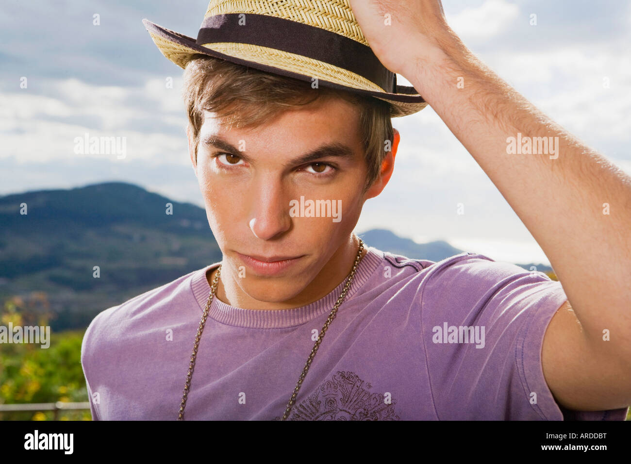 Hand on hat hi-res stock photography and images - Alamy
