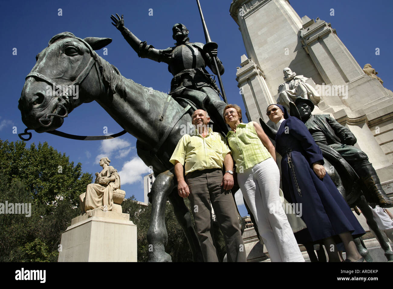 Tourists, Don Quijote statue, Plaza de Espanã, Madrid, Spain Stock Photo