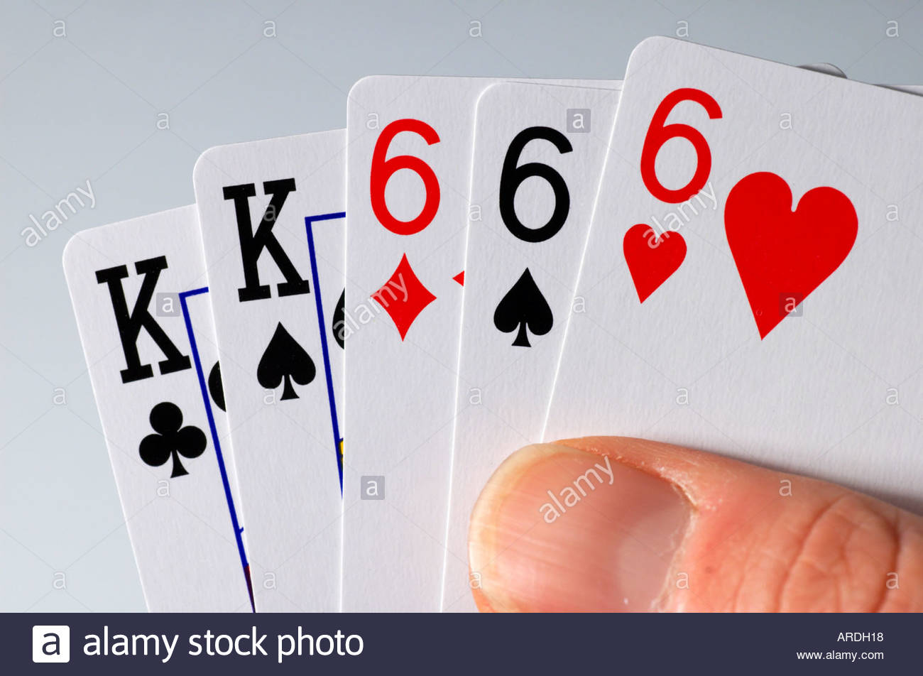 Three of a kind in poker Stock Photo