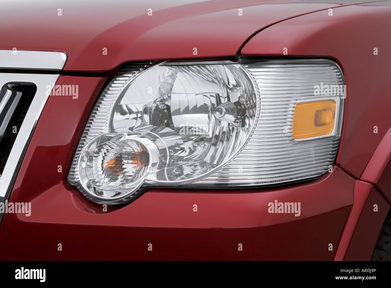 2007 Ford Explorer Sport Trac Limited In Red Headlight