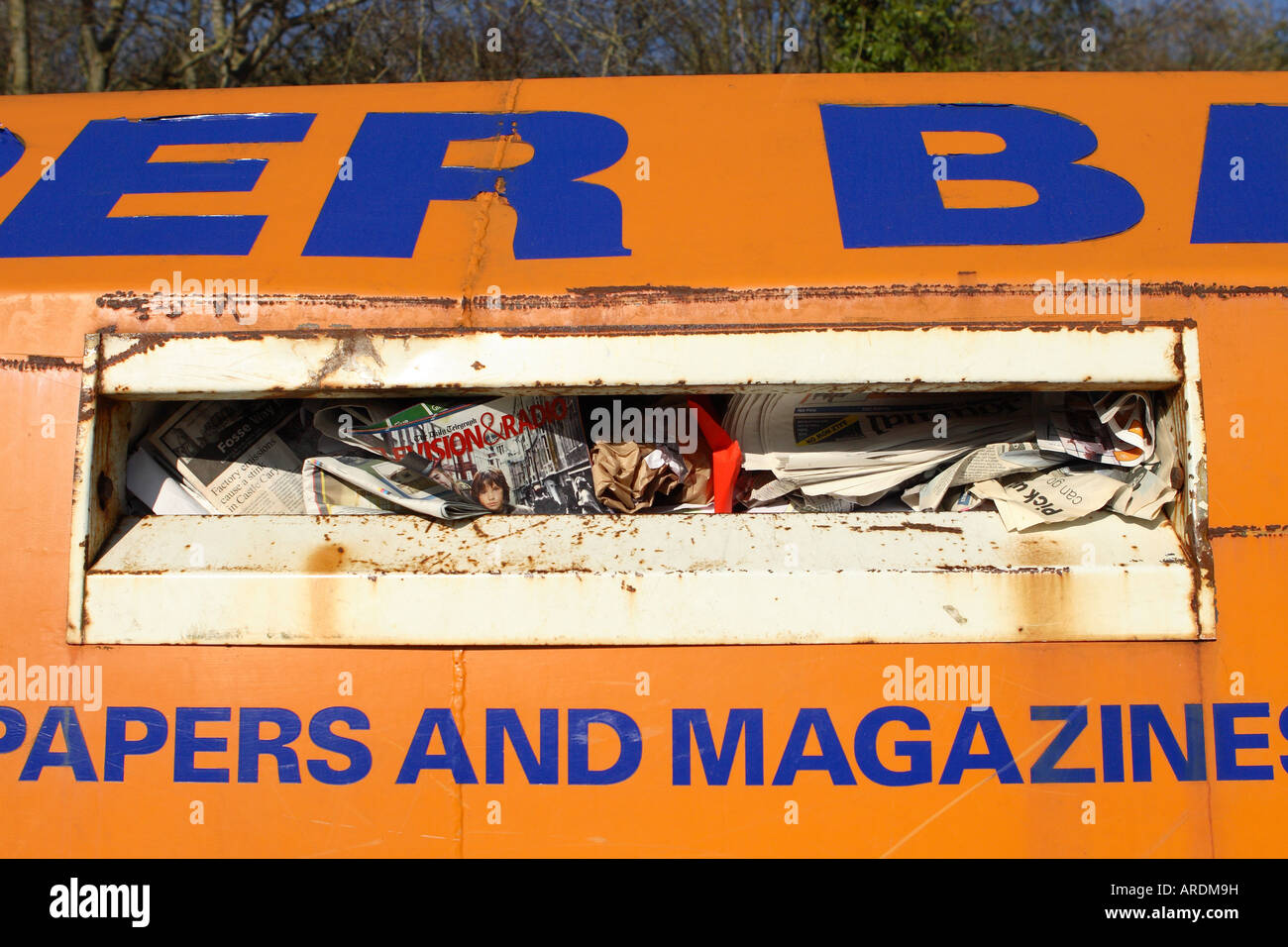 Paper recycling bank skip for old newspapers and magazines in Britain Stock Photo
