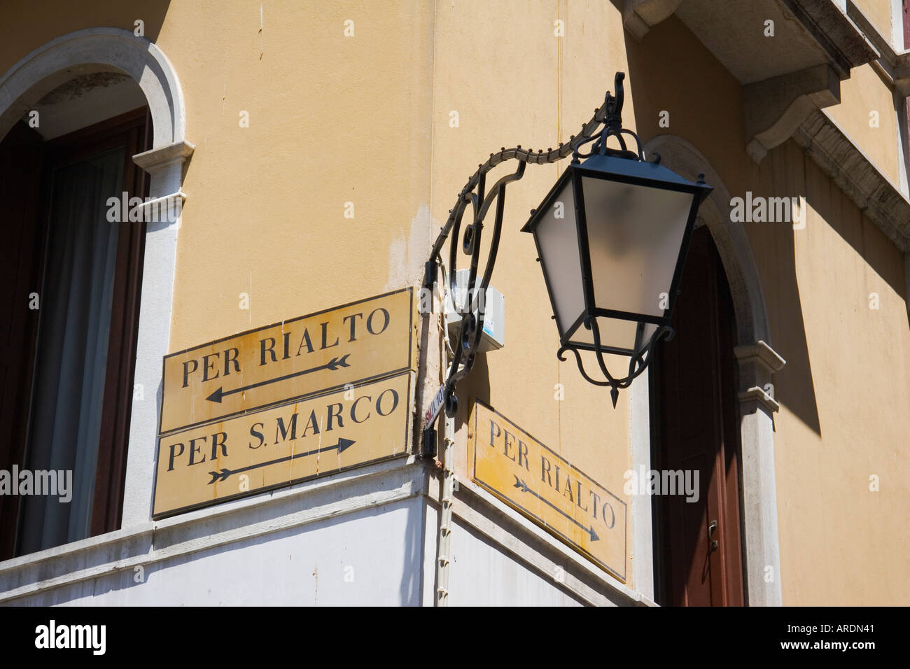 Per Rialto and Per S Marco direction signs on corner of building Venice Italy Stock Photo