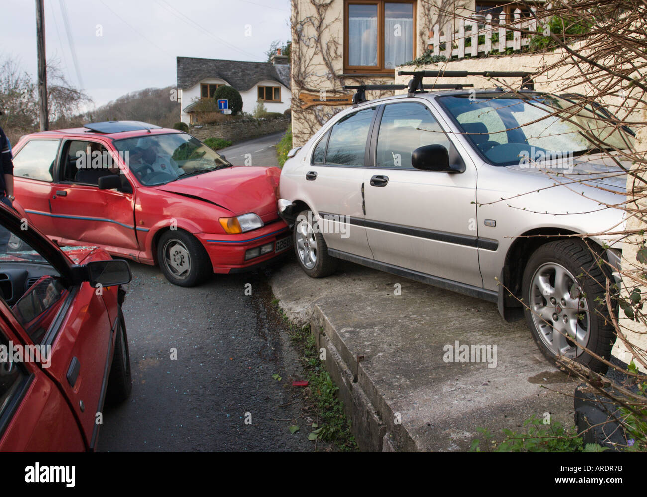 Vehicles badly damaged where one driven whilst under the influence of alcohol has gone into the back of another England Stock Photo