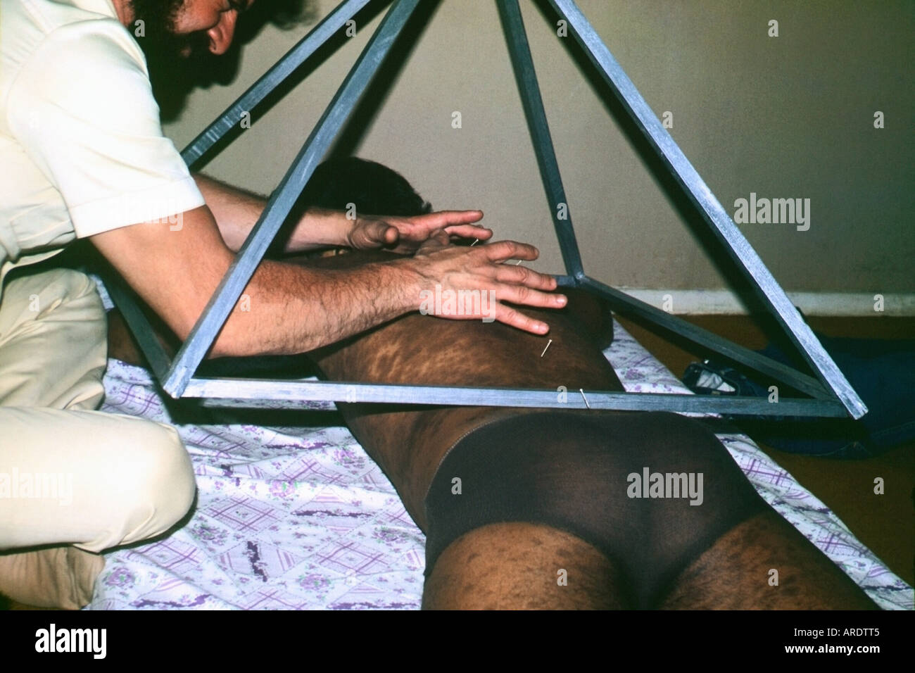 Healer Imposing Hands in Believer Stock Photo