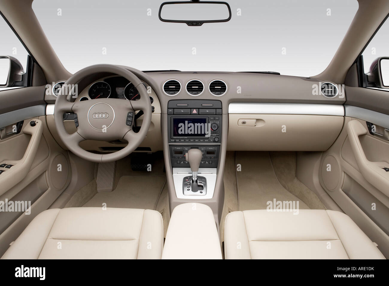 2006 Audi A4 Cabriolet 1.8T in Beige - Dashboard, center console, gear  shifter view Stock Photo - Alamy