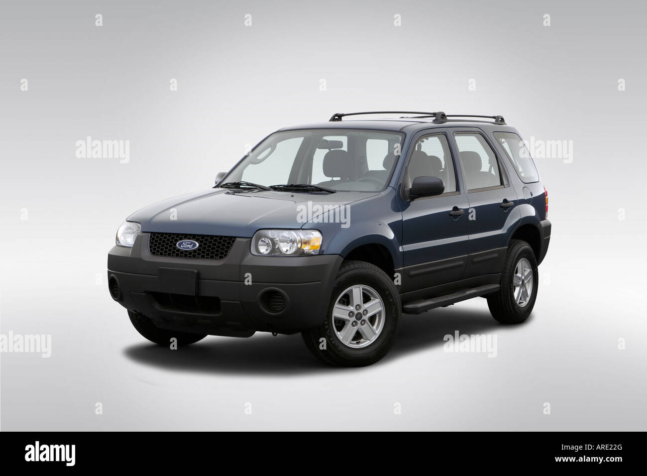 2006 Ford Escape XLS in Blue - Front angle view Stock Photo - Alamy