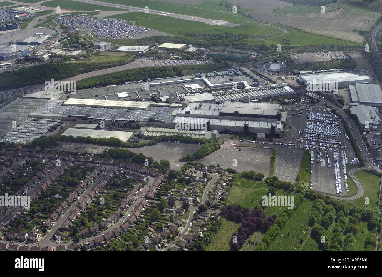 Aerial view of Vauxhall s main plant in Luton with Luton airport off in the background Bedfordshire UK Stock Photo