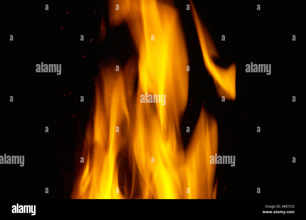Flame fire texture black orange red gold golden yellow blaze flames flaming blazing burning alight Stock Photo