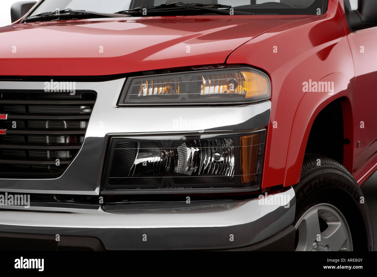 2006 GMC Canyon WT in Red - Headlight Stock Photo - Alamy