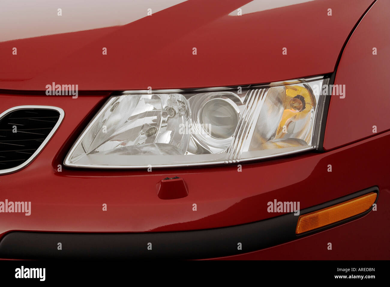 2006 Saab 9-3 2.0T Sport Combi in Red - Headlight Stock Photo