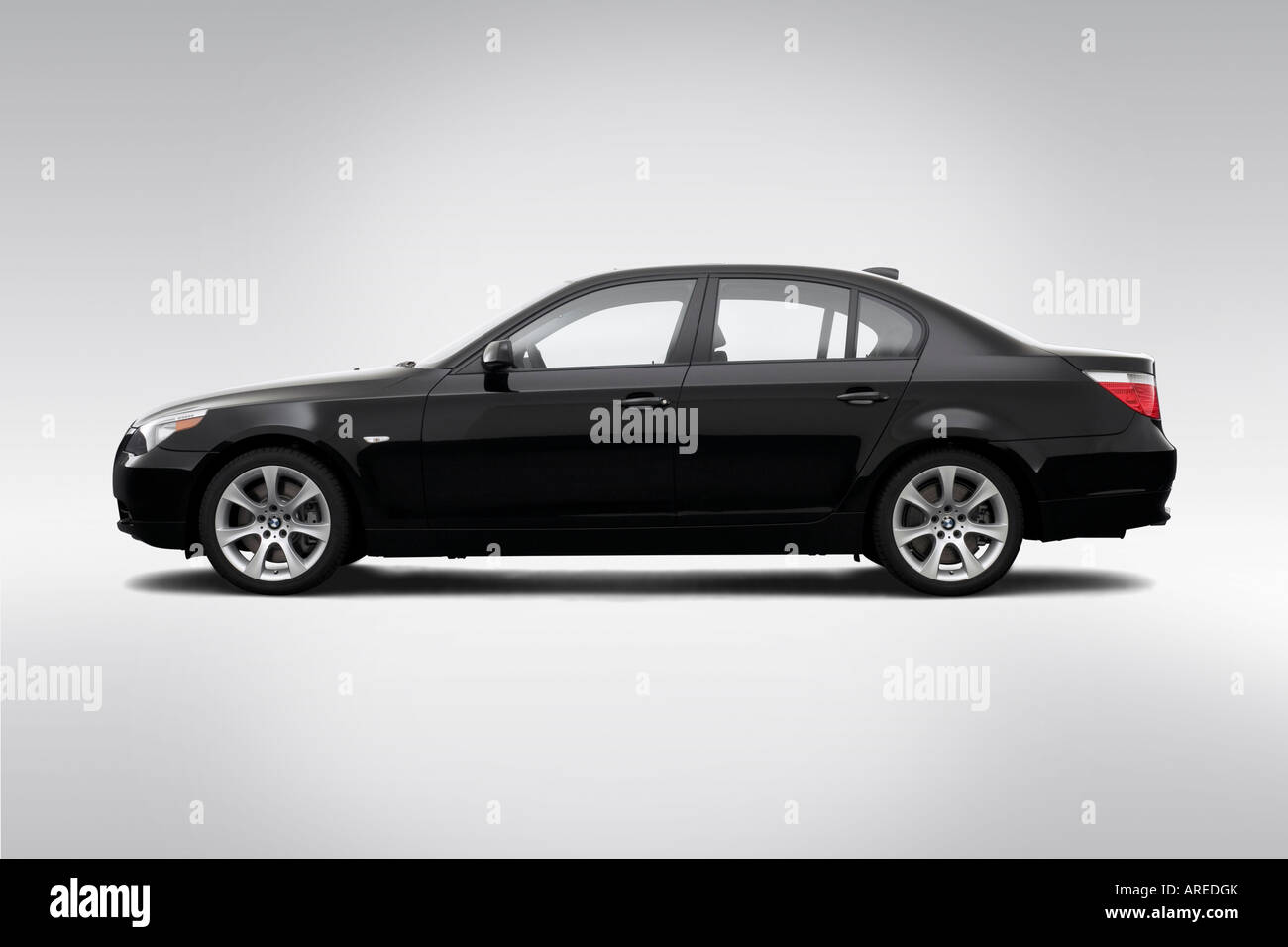 2006 BMW 5-series 550i in Black - Drivers Side Profile Stock Photo