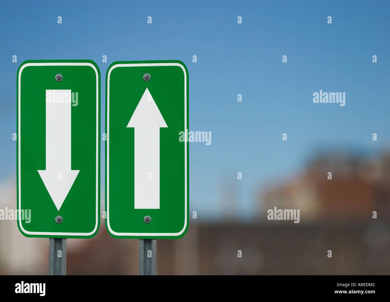 Two Side By Side Green Signs With Arrows Pointing Up And Down In Opposite Directions Stock Photo Alamy Two Side By Side Green Signs With Arrows Pointing Up And Down In Opposite Directions Stock Photo Alamy