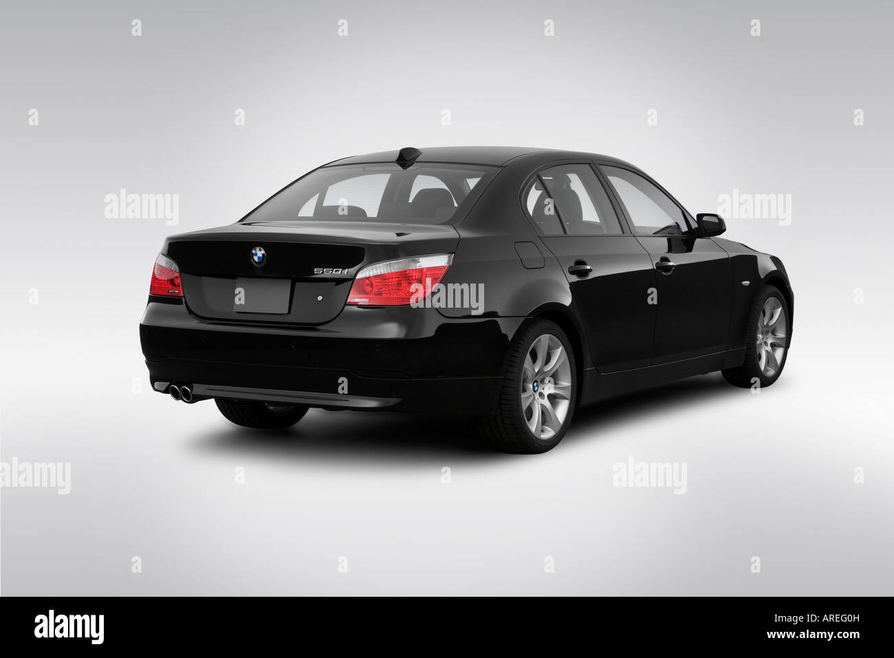 2006 BMW 5-series 550i in Black - Rear angle view Stock Photo